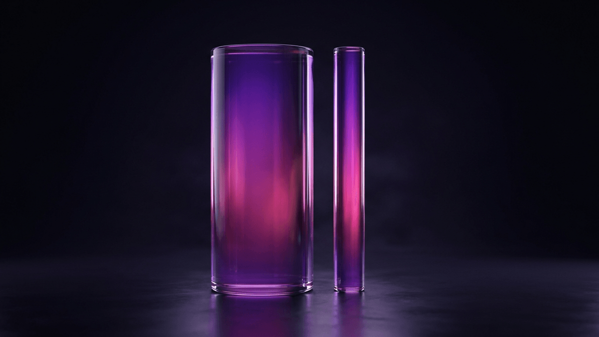 Two glass columns of identical height, one far wider than the other