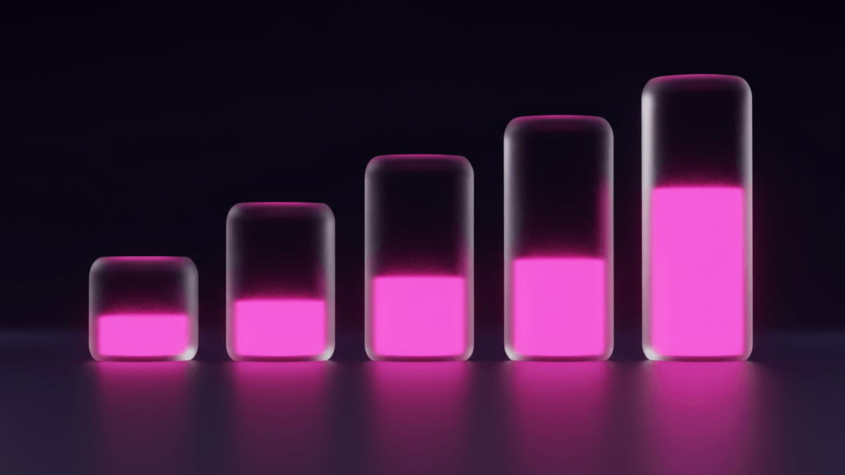 Five glass columns rising in height from left to right, each holding a taller band of light