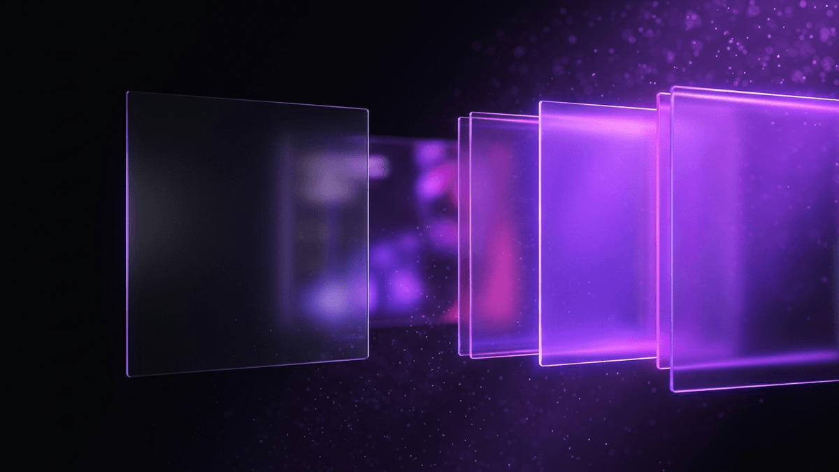 A dimmed glass panel set apart from a brightly violet-lit group