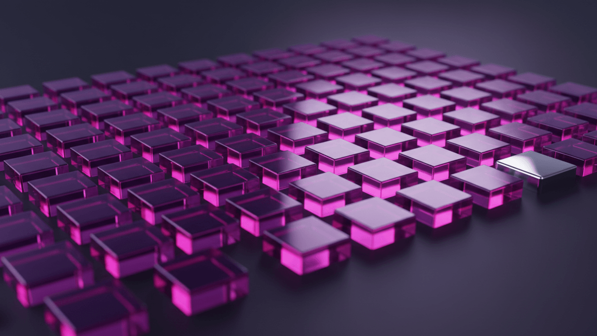 A wide grid of softly glowing glass tiles with one hard chrome tile set apart at its edge