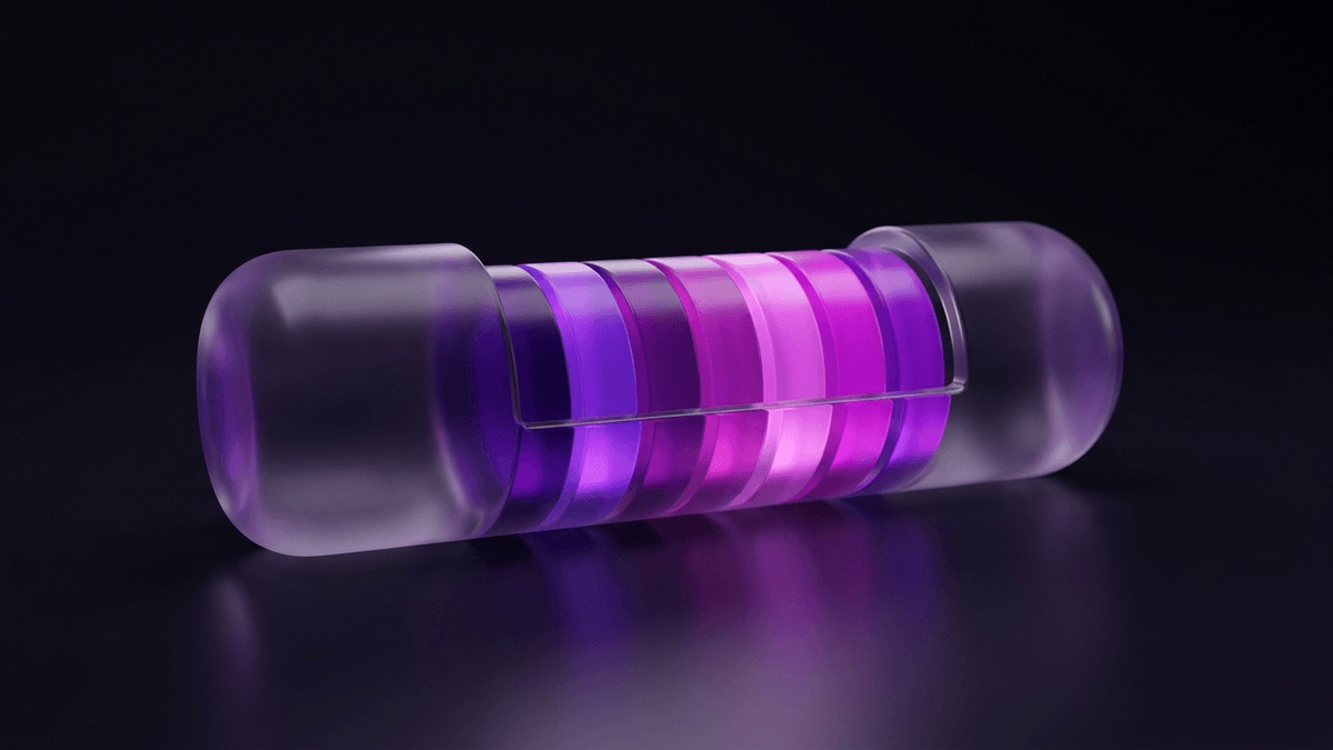 A glass form cut away to show the ordered lit segments layered inside it