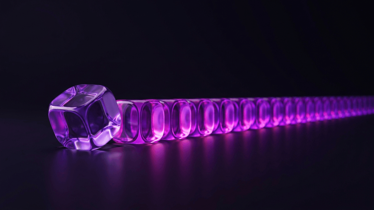 One glass die stamping a row of identical glowing forms